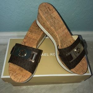 Michael Kors Brown Warren Platform shoes.